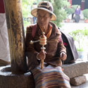 Pilgrim inside the Jokhang Temple, Lhasa, Tibet.