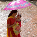 Nepalese mother with child, Bhaktapur, Kathmandu Valley, Nepal.